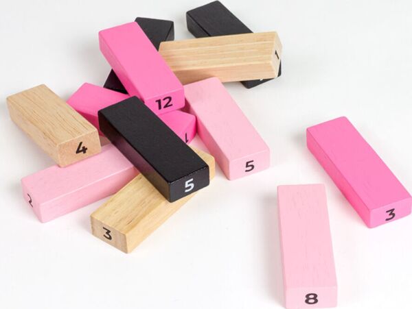 Jeu érotique Secret Play Tower of Sex, avec la tour de pièces en bois de quatre couleurs et ses dés