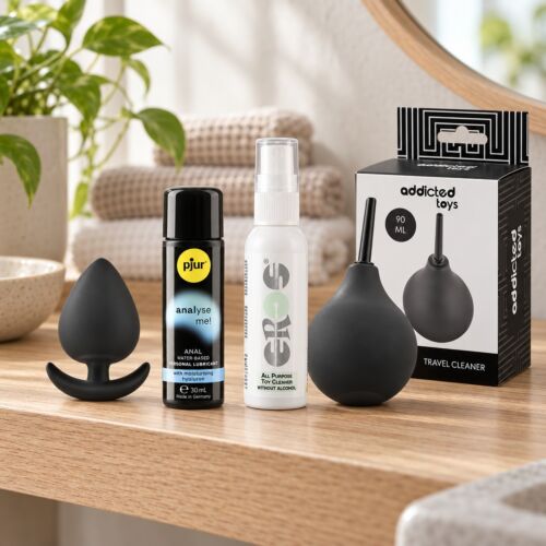 Coffret anal pour débutants avec petit plug en silicone – mise en scène d'ambiance (image générée par IA)