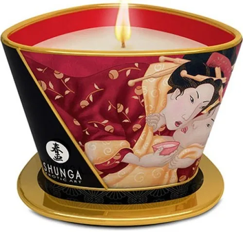 Bougie de massage Shunga Caress by Candlelight, parfum Fraises au cava, allumée
